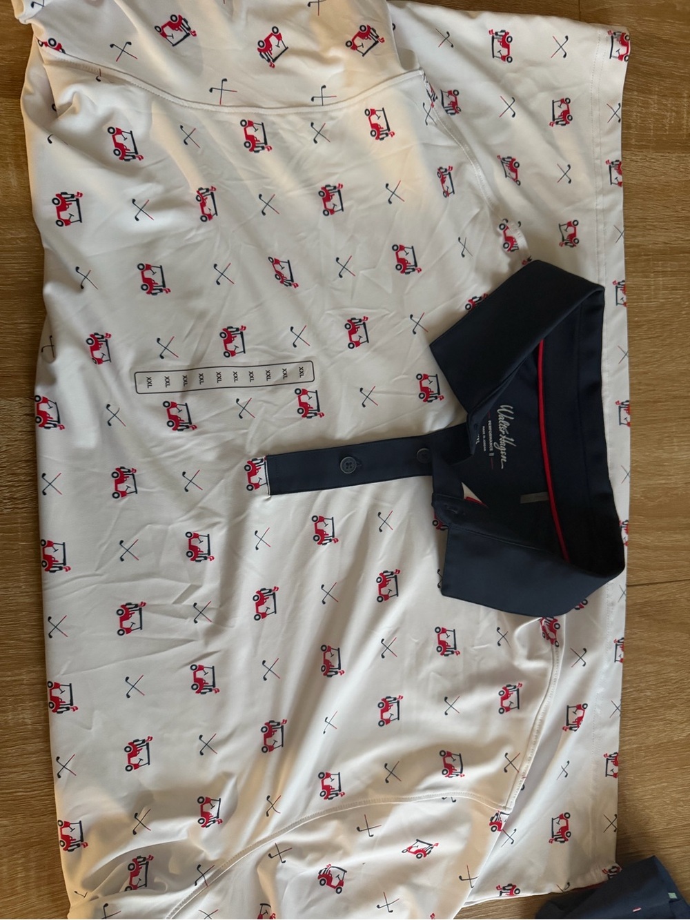 White Polo with Navy Collar and Red Golf Cart Print